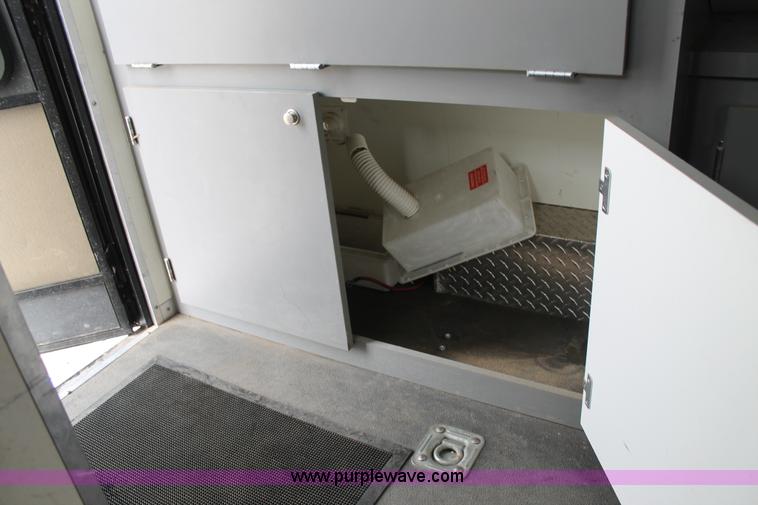 image for item H1576 2002 Coachcraft enclosed fiber optics splitting trailer