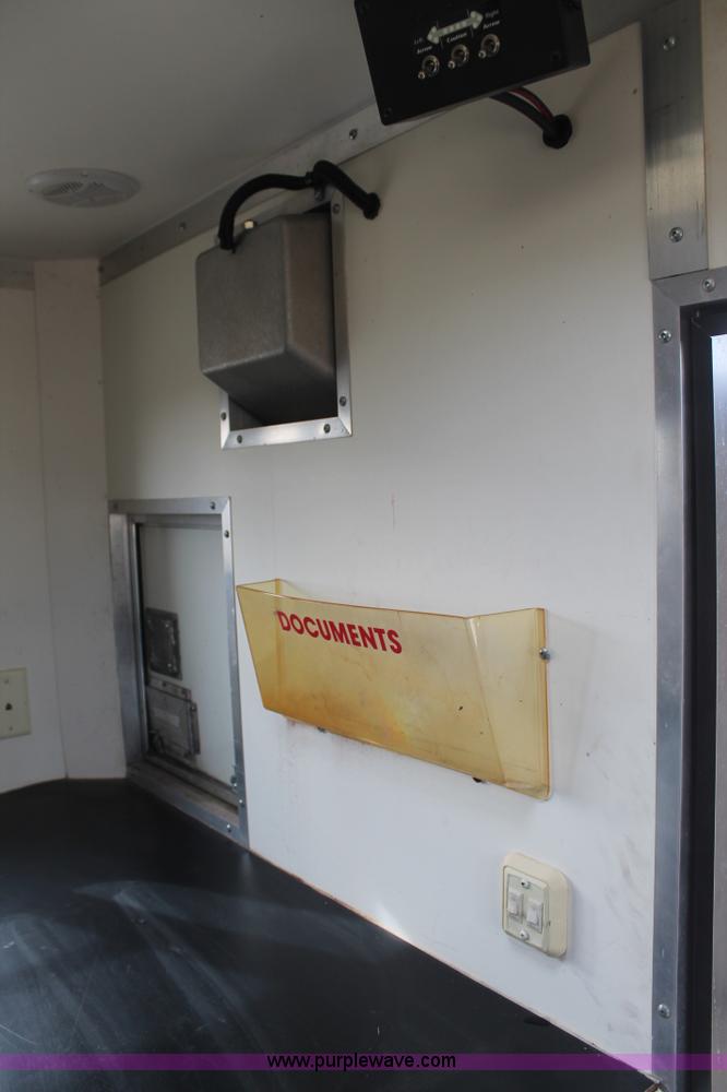 image for item H1576 2002 Coachcraft enclosed fiber optics splitting trailer