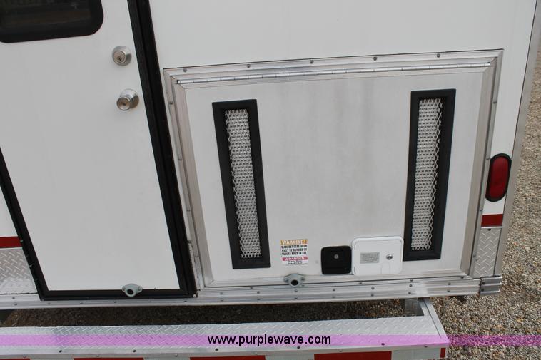 image for item H1576 2002 Coachcraft enclosed fiber optics splitting trailer