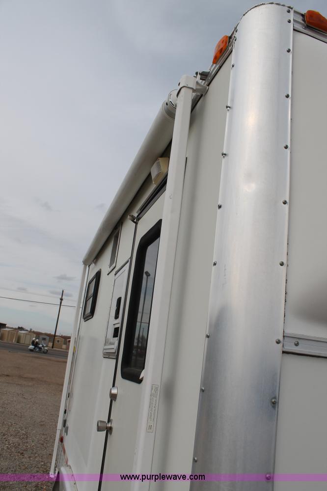 image for item H1576 2002 Coachcraft enclosed fiber optics splitting trailer