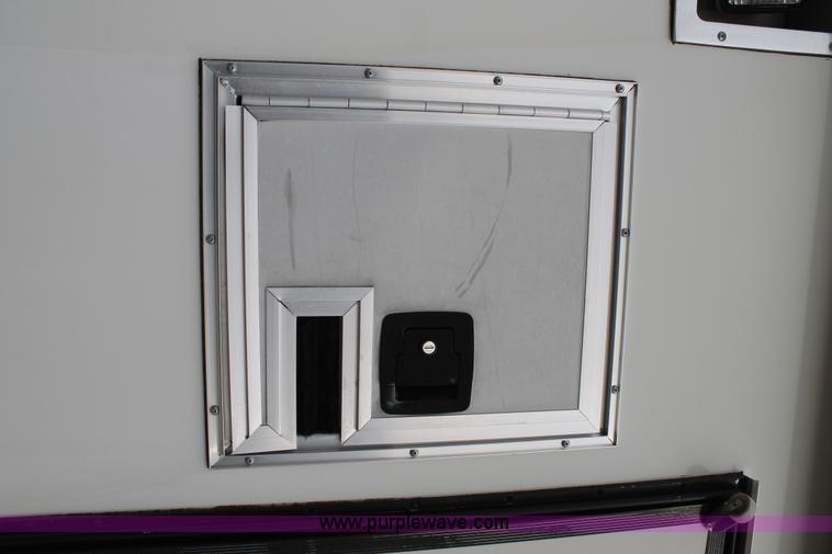 image for item H1576 2002 Coachcraft enclosed fiber optics splitting trailer