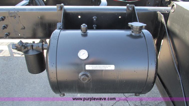 image for item I3085 1999 Sterling L8500 Crew Cab truck cab and chassis