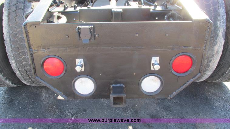 image for item I3085 1999 Sterling L8500 Crew Cab truck cab and chassis