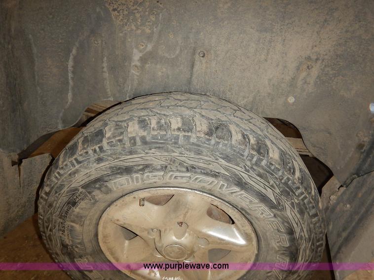 image for item I5014 1999 Dodge Ram 1500 Laramie SLT Quad Cab pickup truck