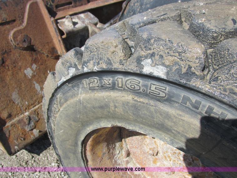 image for item K2047 1996 New Holland LX885 skid steer