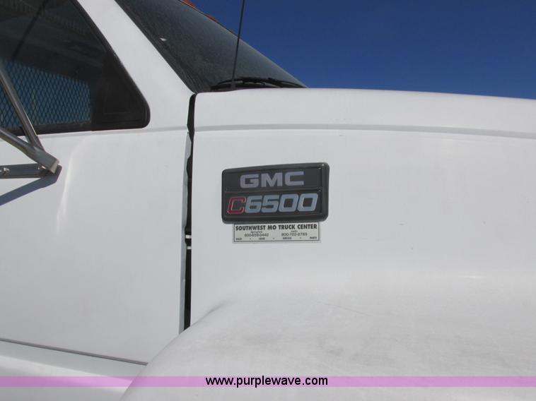image for item K2064 2000 GMC C6500 dump flatbed truck