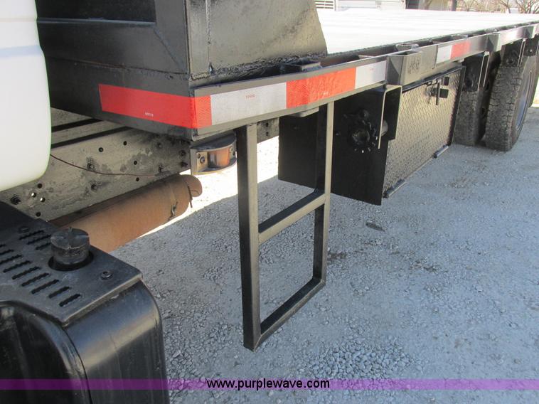 image for item K2064 2000 GMC C6500 dump flatbed truck