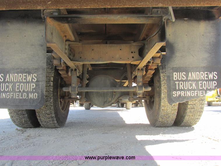 image for item K2064 2000 GMC C6500 dump flatbed truck