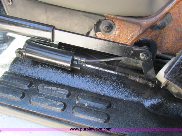 image for item K2064 2000 GMC C6500 dump flatbed truck