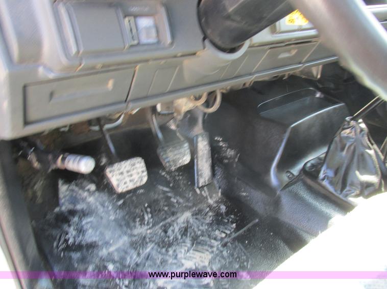 image for item K2064 2000 GMC C6500 dump flatbed truck