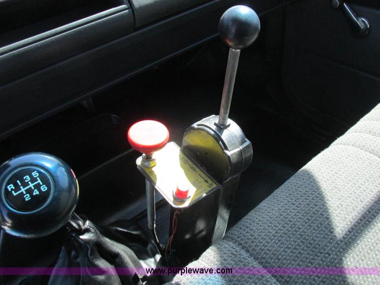 image for item K2064 2000 GMC C6500 dump flatbed truck