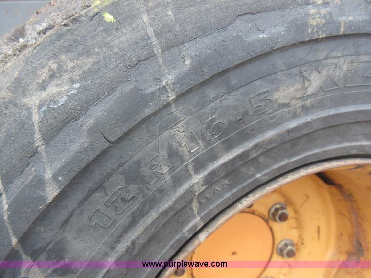 image for item J1946 2004 Case 440 skid steer