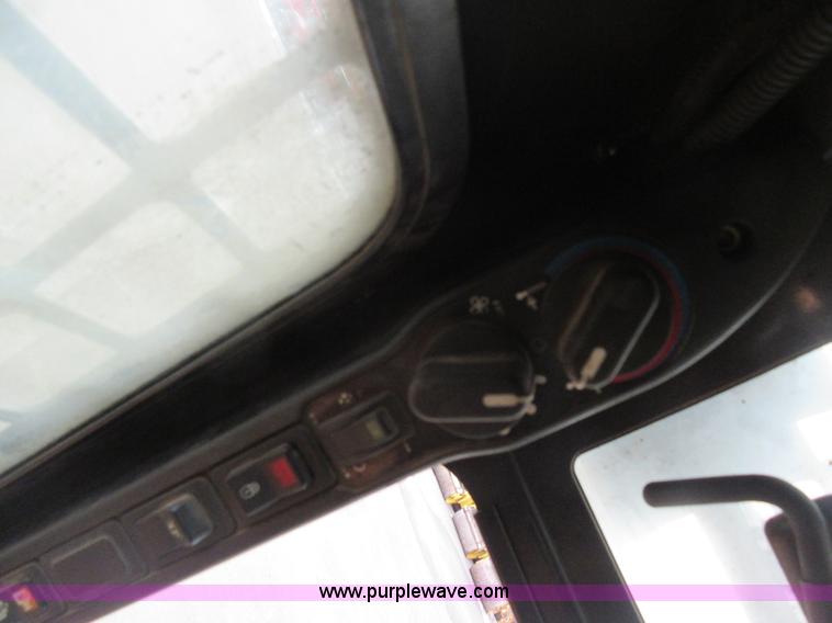 image for item J1946 2004 Case 440 skid steer