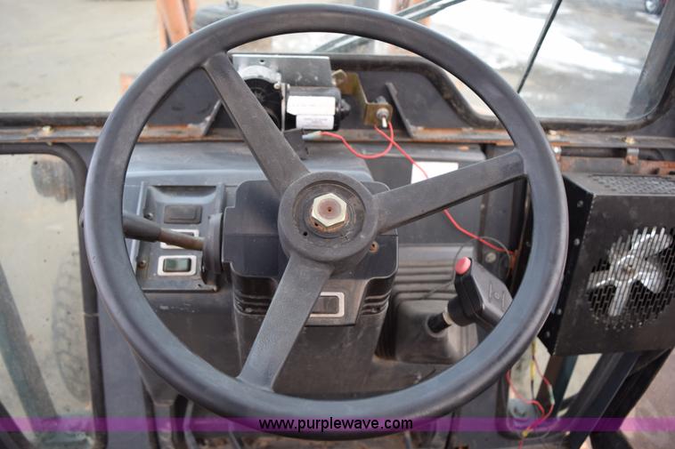 image for item J1954 1998 Case 570XLT landscape loader