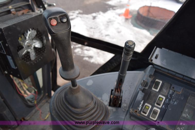 image for item J1954 1998 Case 570XLT landscape loader