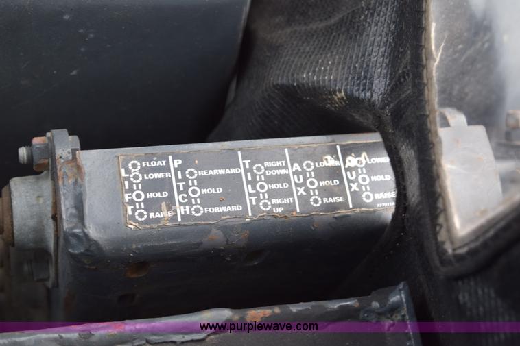 image for item J1954 1998 Case 570XLT landscape loader