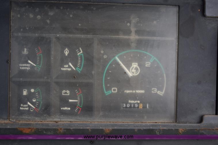 image for item J1954 1998 Case 570XLT landscape loader