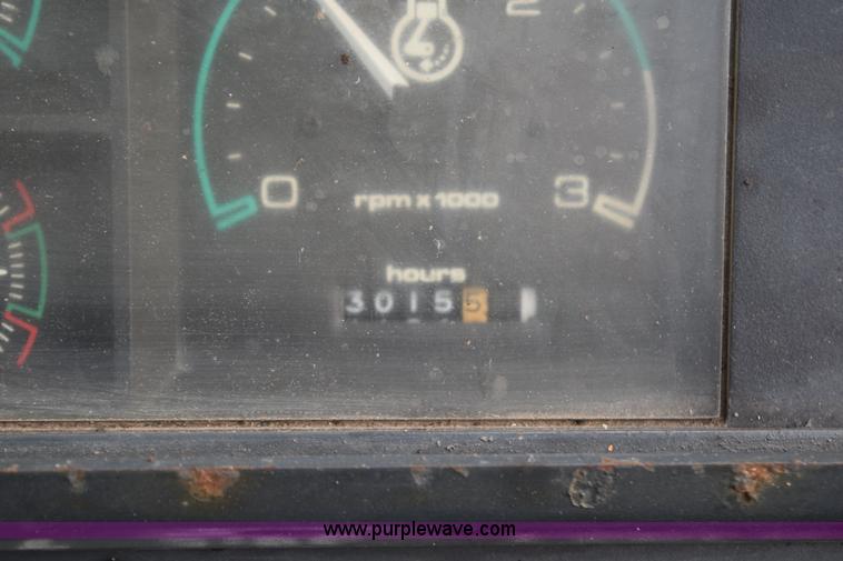 image for item J1954 1998 Case 570XLT landscape loader