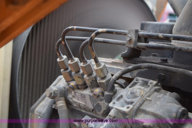 image for item J1954 1998 Case 570XLT landscape loader