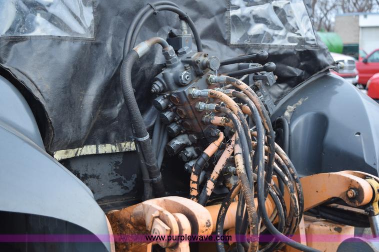 image for item J1954 1998 Case 570XLT landscape loader