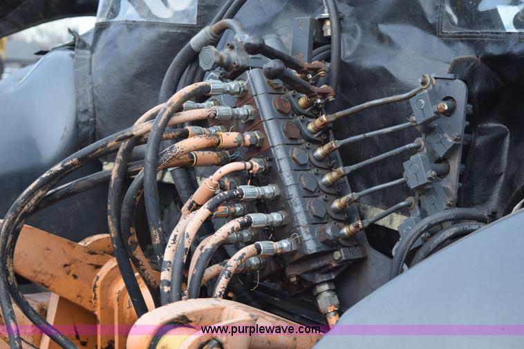 image for item J1954 1998 Case 570XLT landscape loader