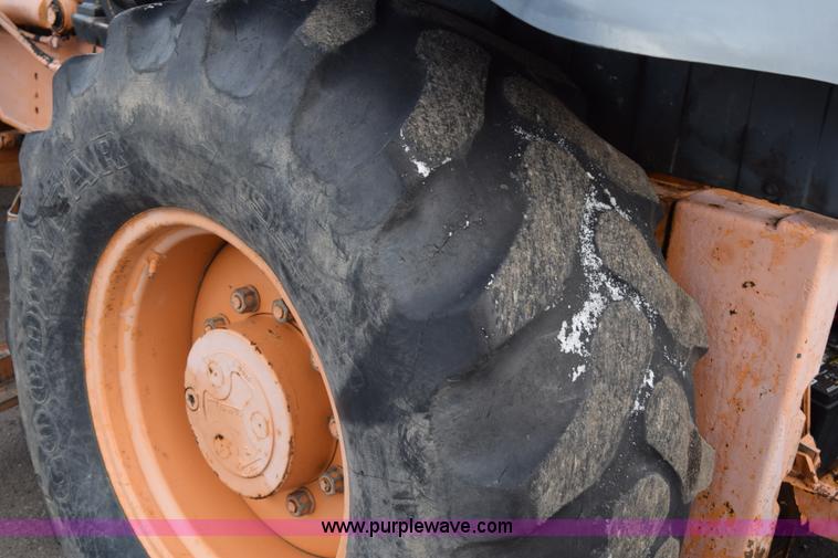 image for item J1954 1998 Case 570XLT landscape loader