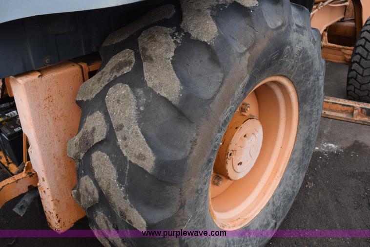 image for item J1954 1998 Case 570XLT landscape loader