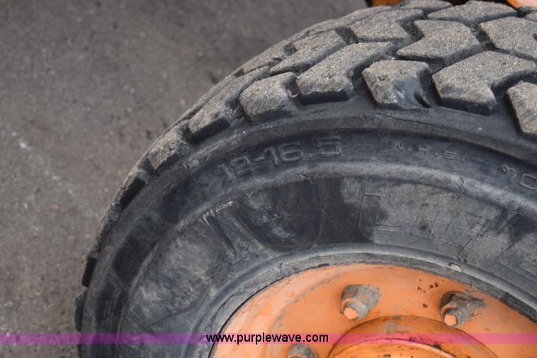 image for item J1954 1998 Case 570XLT landscape loader