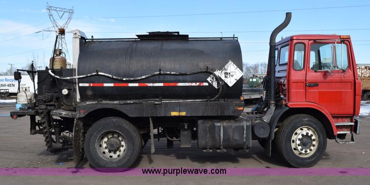 image for item J1967 1999 Mack MS300F oil distributor truck