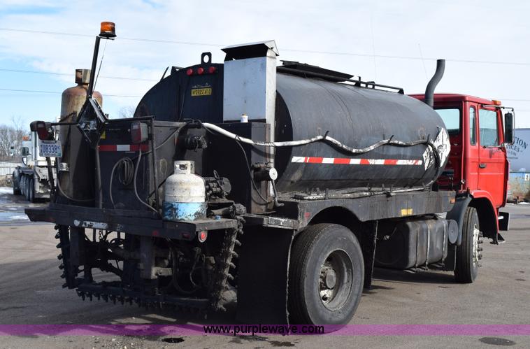 image for item J1967 1999 Mack MS300F oil distributor truck