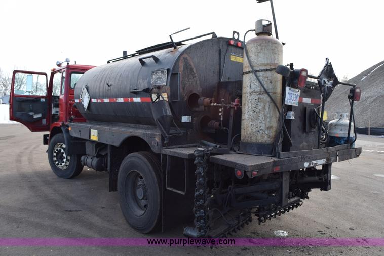 image for item J1967 1999 Mack MS300F oil distributor truck