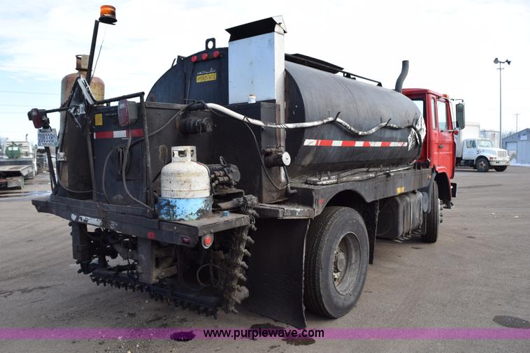 image for item J1967 1999 Mack MS300F oil distributor truck