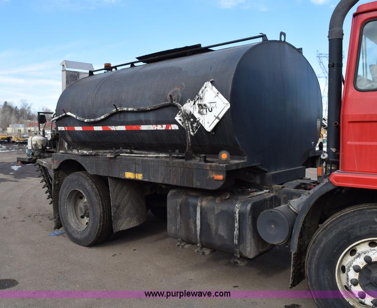 image for item J1967 1999 Mack MS300F oil distributor truck