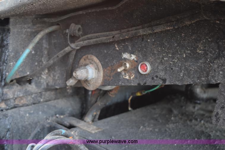 image for item J1967 1999 Mack MS300F oil distributor truck