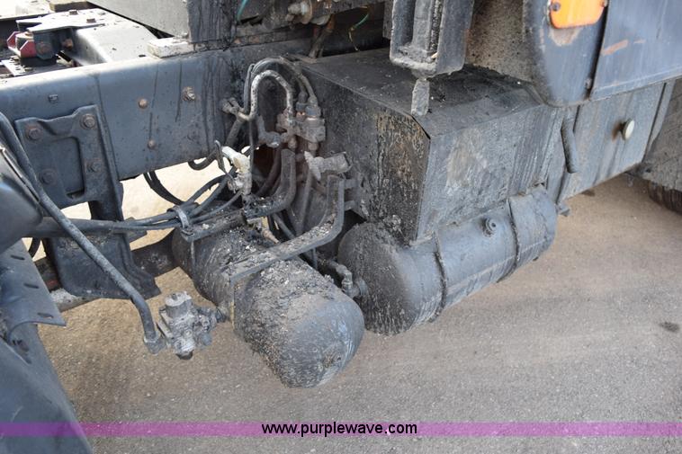 image for item J1967 1999 Mack MS300F oil distributor truck