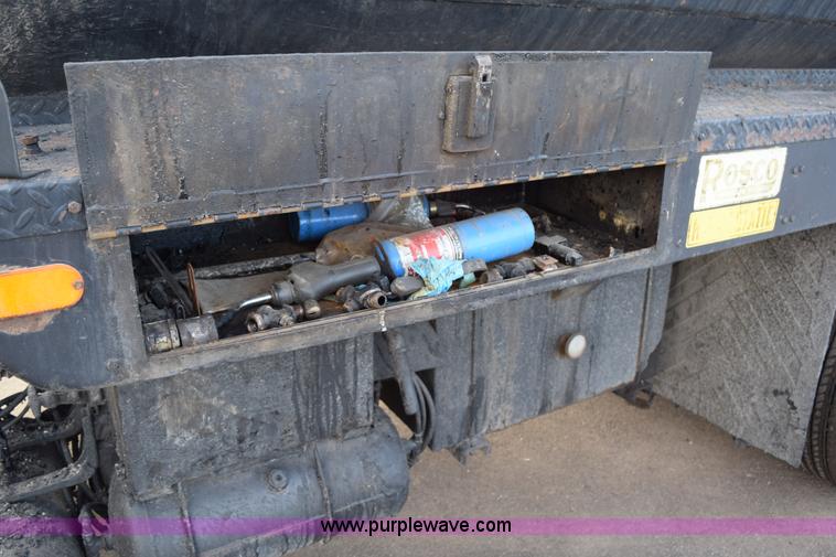 image for item J1967 1999 Mack MS300F oil distributor truck