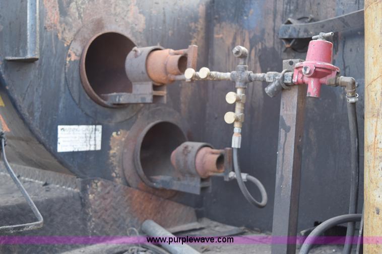 image for item J1967 1999 Mack MS300F oil distributor truck