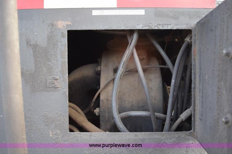 image for item J1967 1999 Mack MS300F oil distributor truck