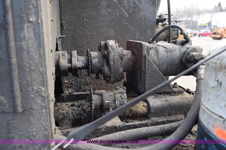 image for item J1967 1999 Mack MS300F oil distributor truck