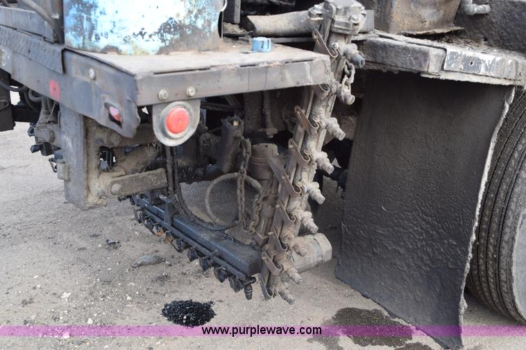 image for item J1967 1999 Mack MS300F oil distributor truck