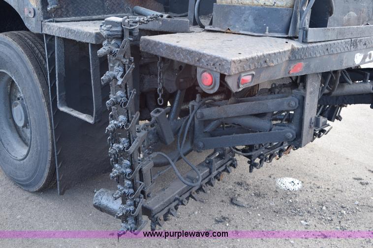 image for item J1967 1999 Mack MS300F oil distributor truck