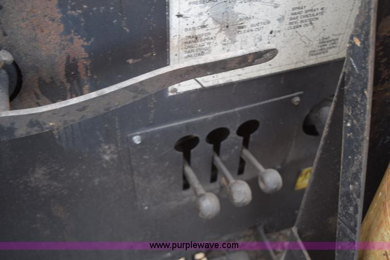 image for item J1967 1999 Mack MS300F oil distributor truck