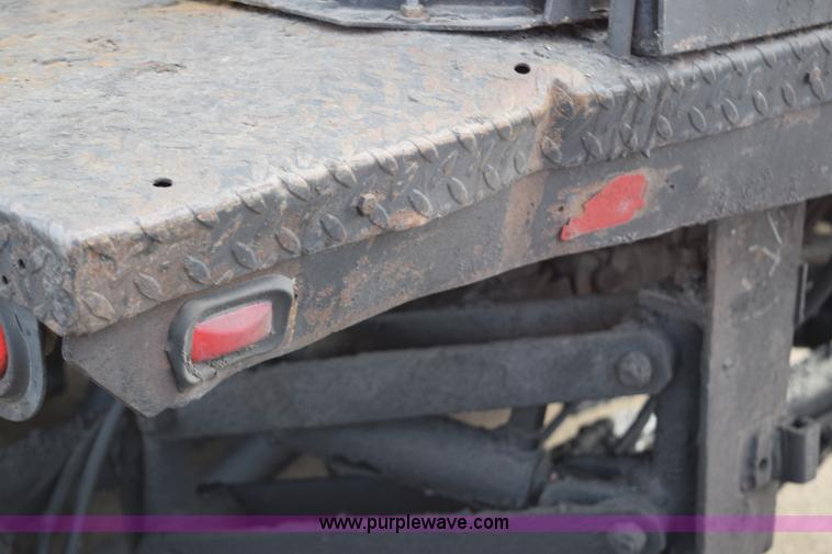 image for item J1967 1999 Mack MS300F oil distributor truck