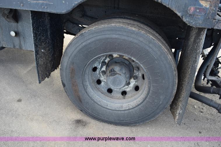 image for item J1967 1999 Mack MS300F oil distributor truck