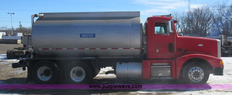image for item J1983 1994 Peterbilt 377 water truck