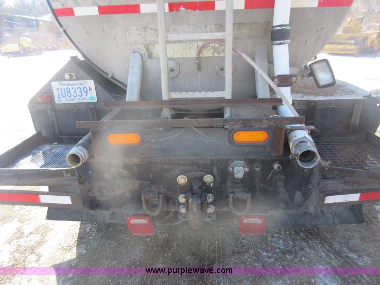 image for item J1983 1994 Peterbilt 377 water truck