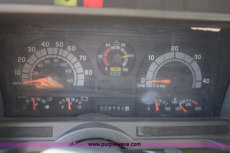 image for item J1989 2002 Chevrolet C8500 dump truck