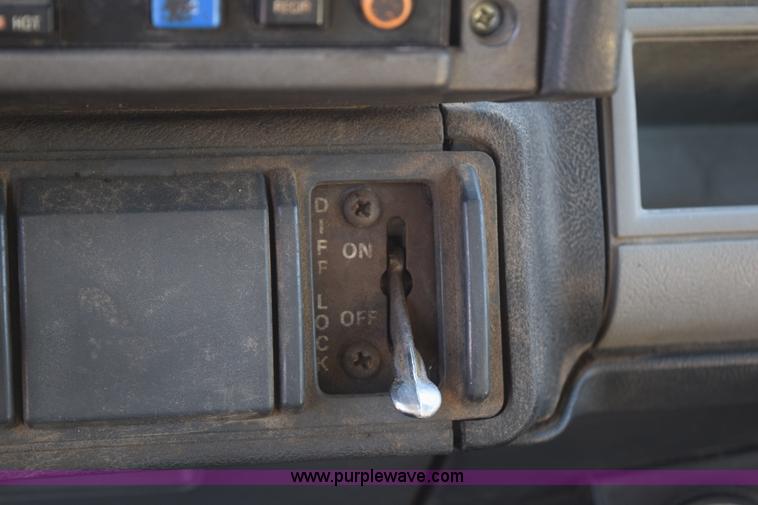 image for item J1989 2002 Chevrolet C8500 dump truck