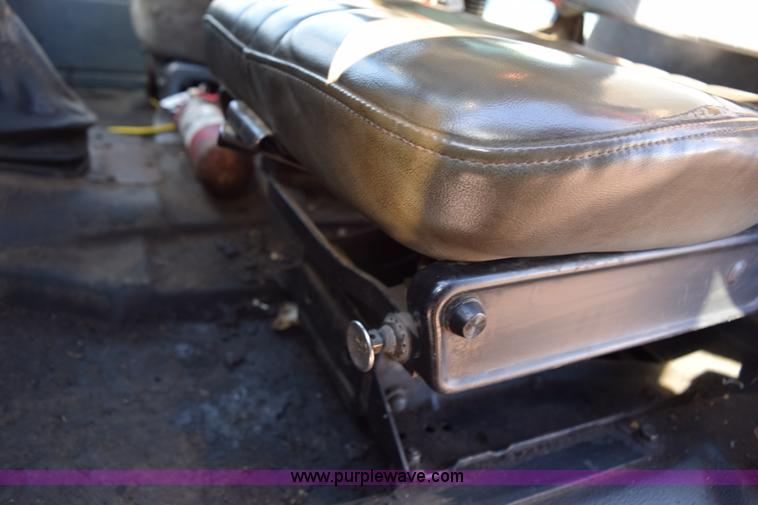 image for item J1989 2002 Chevrolet C8500 dump truck