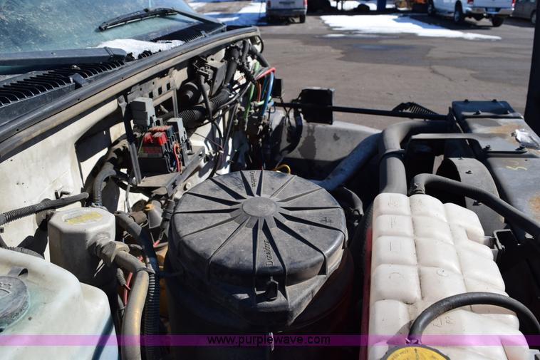 image for item J1989 2002 Chevrolet C8500 dump truck